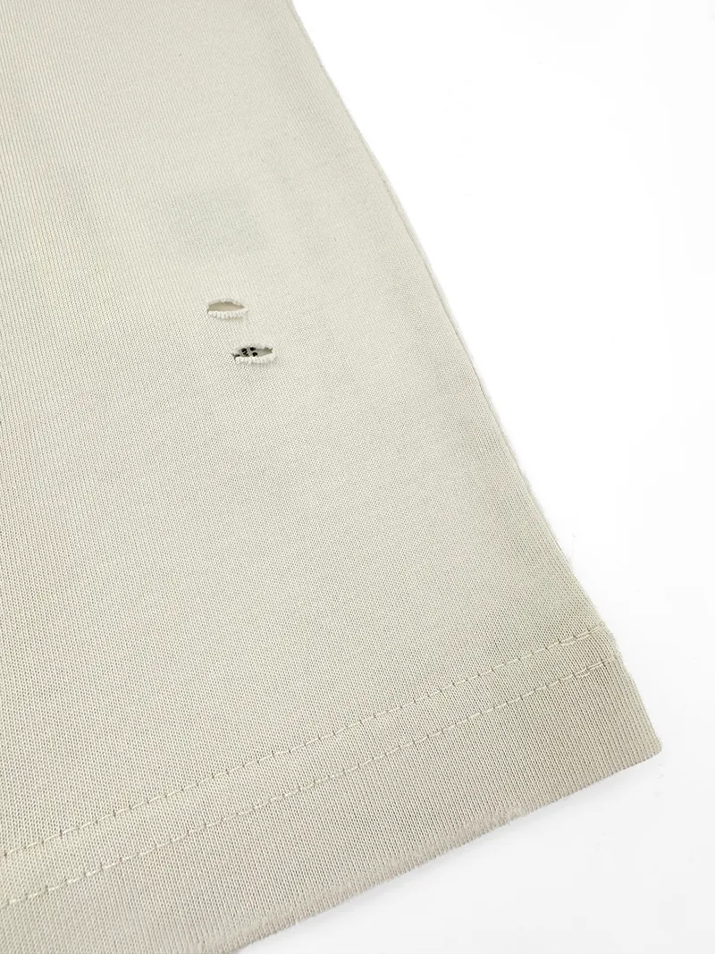 Acne Studios printed distressed long sleeves. Customized air oxygen soft matt jersey. Smooth and delicate. Comfortable and skin-friendly. Cream White base color. Retro luxury hidden in the distressed texture. Relaxed and high-end. The front and back are engraved with flame gothic fonts. Acne Studios' dark subculture edge flows naturally. Hand-carved holes and worn details. Replicate the wild texture accumulated over time. The ultimate interpretation of the luxurious collision of Nordic minimalist style and street rebellious spirit. Process 1: Use glue printing process. The chest printing has been modified three times with the film screen. Use glue liquid paint to print the pattern on the fabric. Bake the fabric to fix the printed pattern. Process 2: Many parts of the body are worn by pure manual regular positioning. Manual brushing marks add texture and depth to the surface of the clothing to imitate the texture of natural wear. Process 3: The fabrics have been fermented and washed. The texture is better, not easy to deform, not easy to shrink, not easy to fade, and maintains long-term beauty. Accessories: Customized 1:1 Acne trademark Fit: Loose fit Size: S M L XL Style number: BB